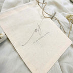 Arras Arena Novellie, conjunto de arras de boda en diseño elegante con detalles en color plateado y acabado brillante.