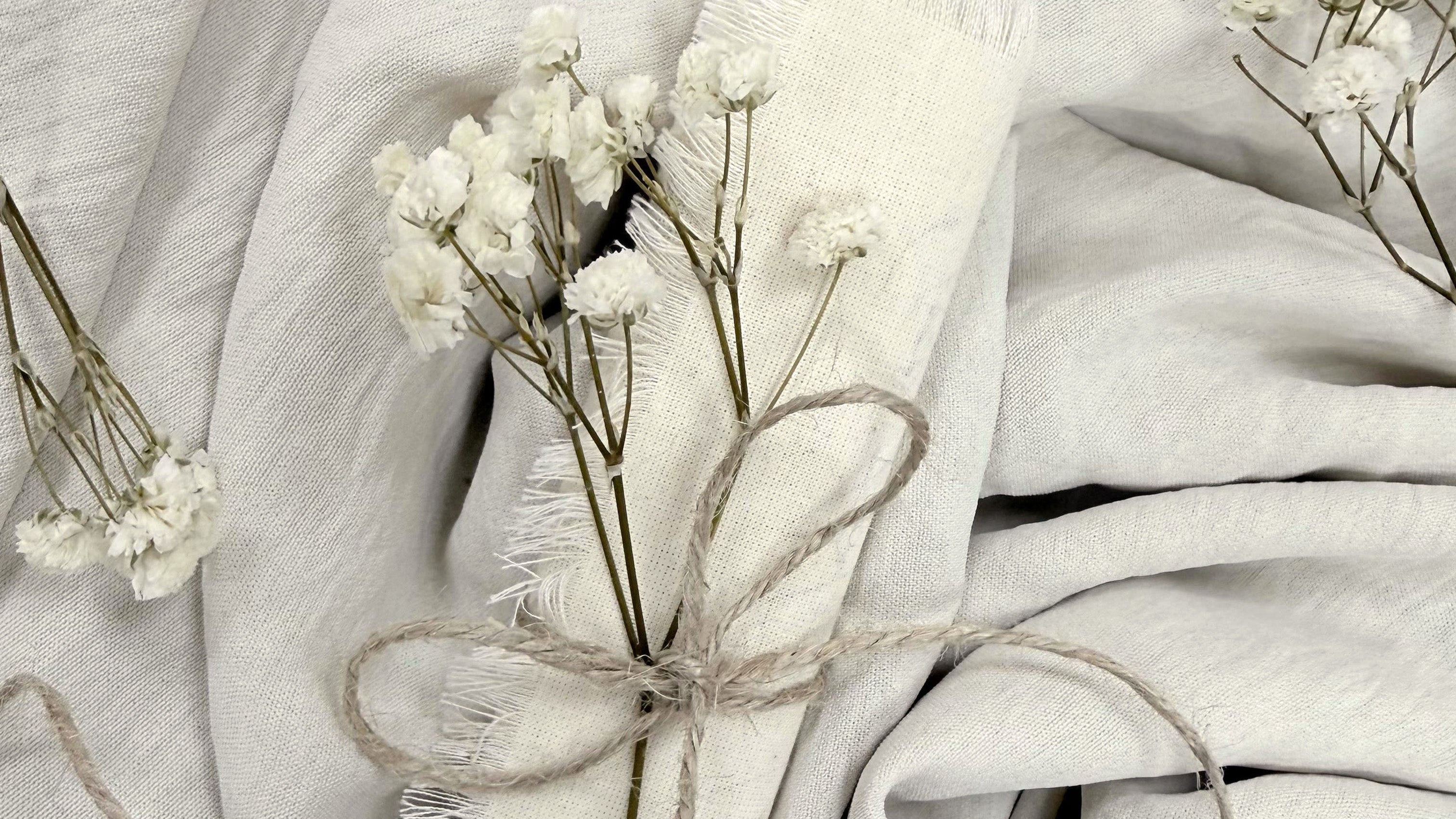 Menú de algodón de la marca Novellie, con diseño de papel y textura suave visible en la imagen.