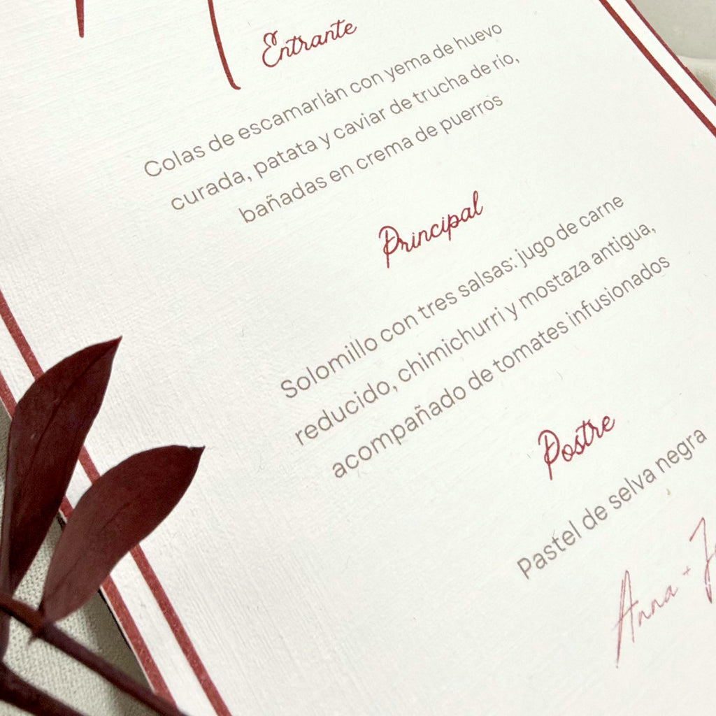 Menú lazo de Novellie, elegante y decorativo en tonos dorados y negros, ideal para eventos y celebraciones.